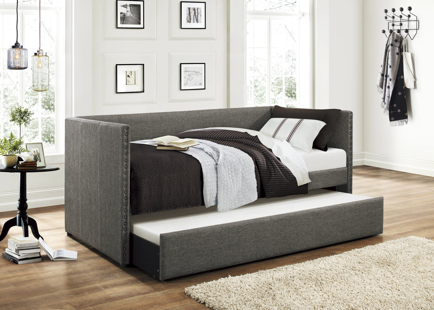 GRAY DAYBED WITH TRUNDLE & NAILHEAD TRIM